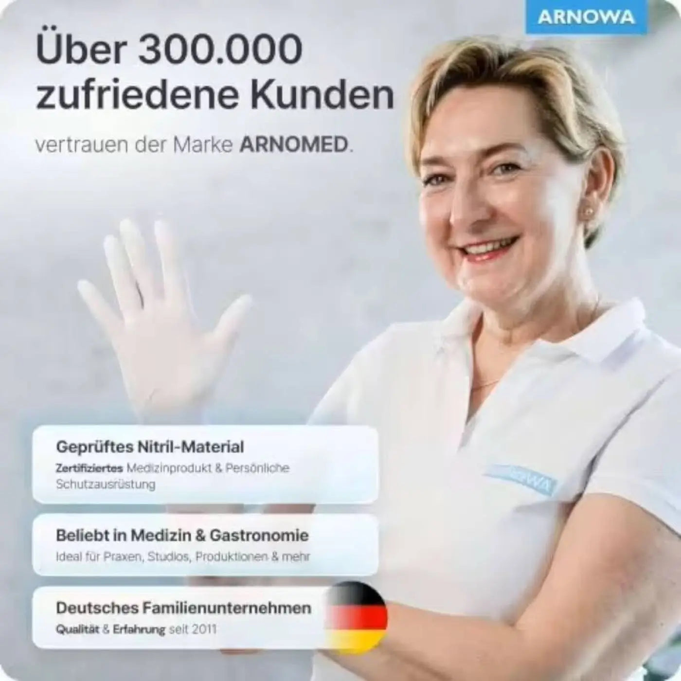 Weißes nitril-einweghandschuh aus medizinisch zertifiziertem material getragen von frau in professioneller kleidung