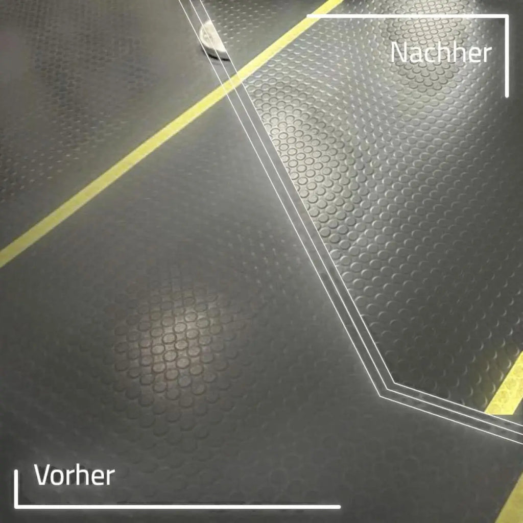 Black rubber floor mat with textured circular pattern and yellow boundary lines for herwetec schukolin grundreiniger 10 liter
