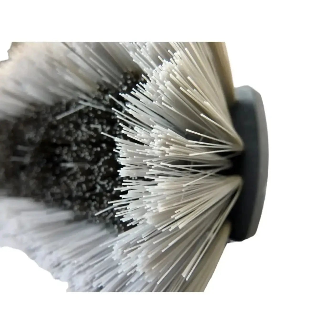 Nahaufnahme der unger nLITE power bürste komplett ungesplissen grau mit schwarzem griff und weißen borsten und grauer abrasive