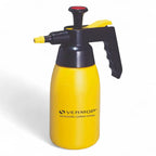 Gelber vermop druckpumpzerstäuber aus kunststoff mit schwarzem und gelbem akzent, rotem oberteil und ergonomischem griff