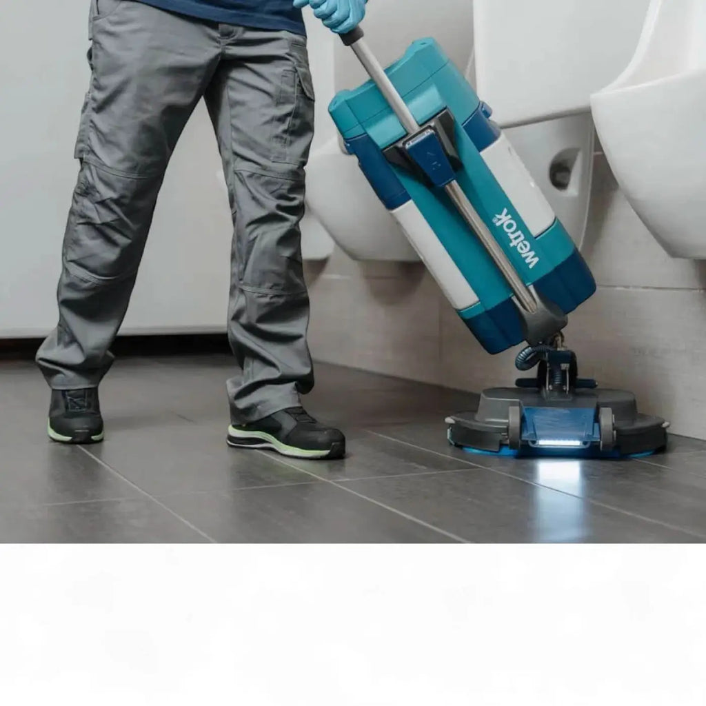Teal und weiße wetlook bodenreinigungsmaschine wetrok spin befree mit schwarzer basis, frontansicht